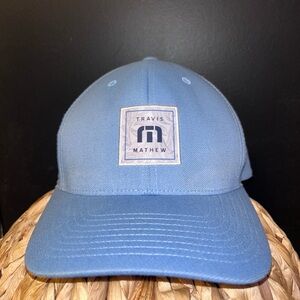 TravisMathew Final Boarding SnapBack Hat Flexfit 110 technology